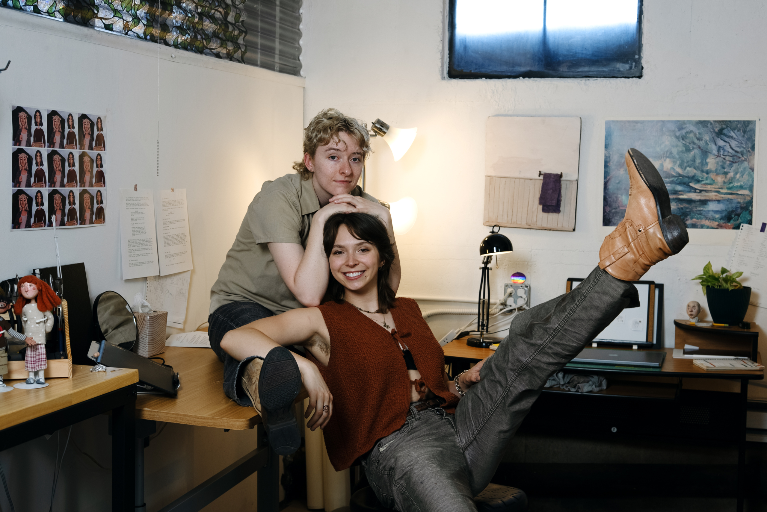 AJ and Carmela in their office